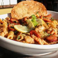 Creole · Spicy. Spiced chicken and Andouille sausage in a Louisiana
cream sauce over penne.