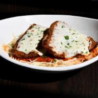 Chicken Parmesan · Lightly breaded with Italian seasoning, topped with marinara
and house made mozzarella, serv...