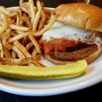 Eggplant Parmesan · Lightly breaded with Italian seasoning, topped with marinara and house-made Mozzarella, serv...