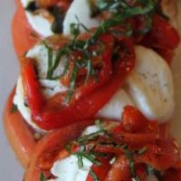 Bruschetta · Toasted Italian-style bread topped with a medley of chopped tomatoes, fresh basil, onion, ga...