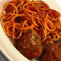 Pasta With Meatballs · Pasta topped in our homemade meatballs.