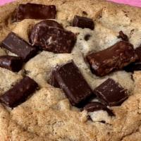 Decadent Chocolate Chip Cookies  · Big, gourmet cookie made with classic chocolate chip dough topped with Hershey's® mini kisse...