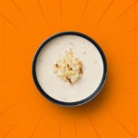 Rice Kheer · Bits of broken basmati rice slow-cooked in a milk reduction, mildly flavored with cardamom, ...