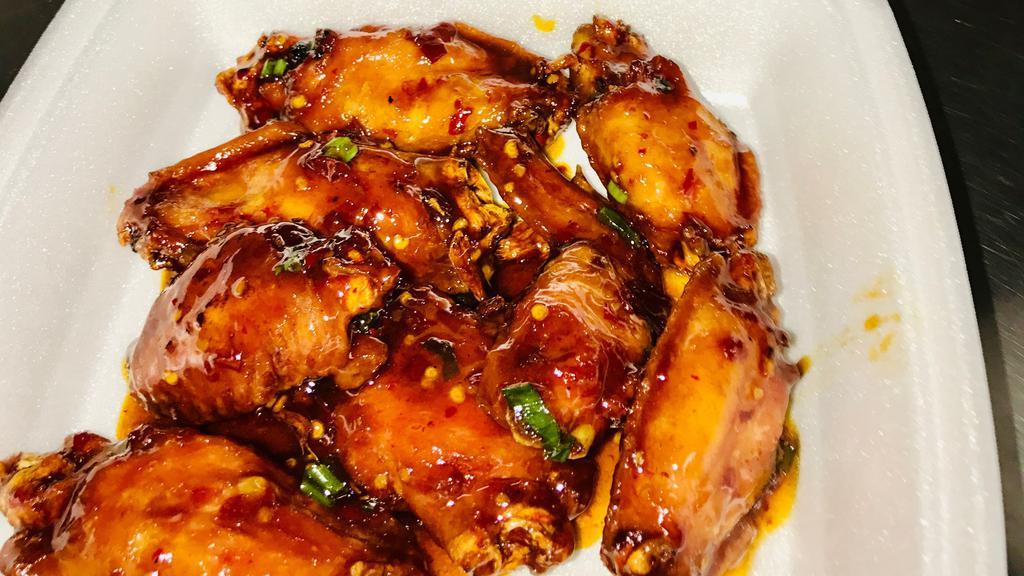 Fried Chicken Wings W/ Garlic Chili Sauce · Hot & Spicy