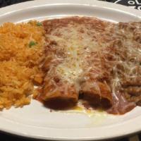 C. Chicken Enchiladas · Two chicken enchiladas with sour cream sauce and jack cheese or green sauce. All plates serv...