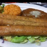 Flautas · Your choice of three beef or chicken flautas served on a bed of green salad with a side of s...