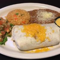 Burrito · Large flour tortilla filled with ground beef or spicy chicken with rice and beans, a side of...