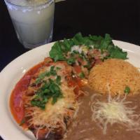 D. Cheddar Cheese Enchiladas · Two cheddar enchiladas topped with queso sauce. All plates served with rice and beans.