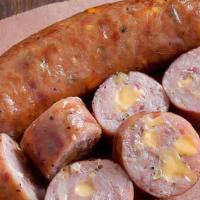 Chorizo Calabresa Jalapeno · Grilled Argentinian pork sausage stuffed with Jalapeno and Cheddar cheese served with chimic...
