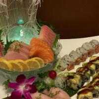 Sushi And Sashimi For 2 · Serves two. Fifteen pieces sashimi, eight pieces sushi spicy tuna roll and dragon roll. Serv...