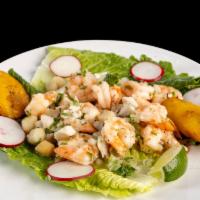 Ceviche · Fresh shrimp, scallops, calamari, and tilapia
marinated in lime juice and mixed with
sliced ...