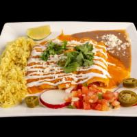 Ground Beef ...Enchiladas · Contains nuts and gluten. Made with our famous mole poblano, filled with your choice of chic...
