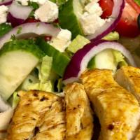 Greek Grilled Chicken Salad On Pita · Freshly chopped Romain garnished with fresh cut tomatoes, cucumbers, red onions, feta cheese...