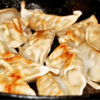 Gyoza · Pork and veggie dumplings (6 pieces) steamed or pan-fried.