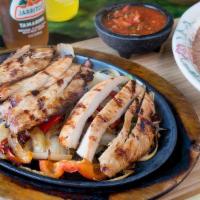 Chicken Fajitas · SERVED WITH MEXICAN RICE, REFRIED BEANS, PICO DE 
GALLO, LETTUCE, GUACAMOLE, SOUR CREAM AND ...