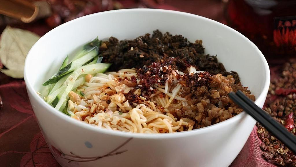 Chengdu Dan Dan Noodles · Contains peanuts. Vegetarian. Ground pork, cucumber, peanuts, green onion, special spices and sauce.