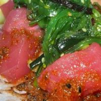 Tuna Poki Salad · Fresh tuna, seaweed salad 
Dressing Choice: Mild or Spicy