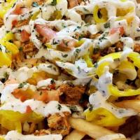 Mini Shawerma Fries · A mini order of Fries topped with Banana Pepper
Mo’s Sauce - Diced Onion & Tomato - Your cho...