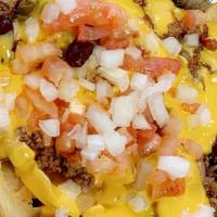 Large Chili Cheese Fries · Fries - Chili - Cheese Sauce - Diced Onion - Diced Tomato