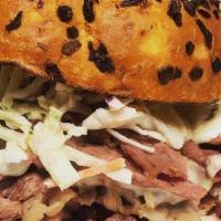 Double Decker Slaw · Hand Cut Pastrami Or Corned Beef -  Coleslaw
Swiss Cheese - Served on French Onion Bun