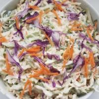 Coleslaw · With carrots, celery seed, and secret ingredient.