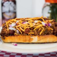 Chili Dog · Kosher dog with House Made chili on A toasted Poppy roll