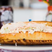 Milly Ann Dog · Kosher dog with Coleslaw and Russian dressing on a poppy seed roll
