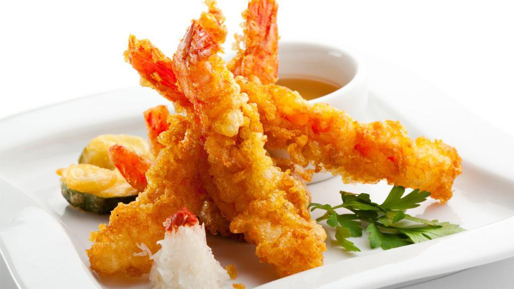 Shrimp Tempura · 6 pieces of lightly breaded and fried shrimp.