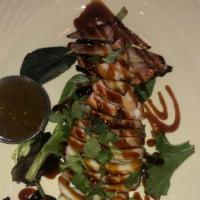 Grilled Whole Squid · Spicy. Spicy lime sauce.