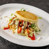 Arepa · Grilled corn bread with your choice of  fillings and special sauce. | Arepa con el rellenos ...