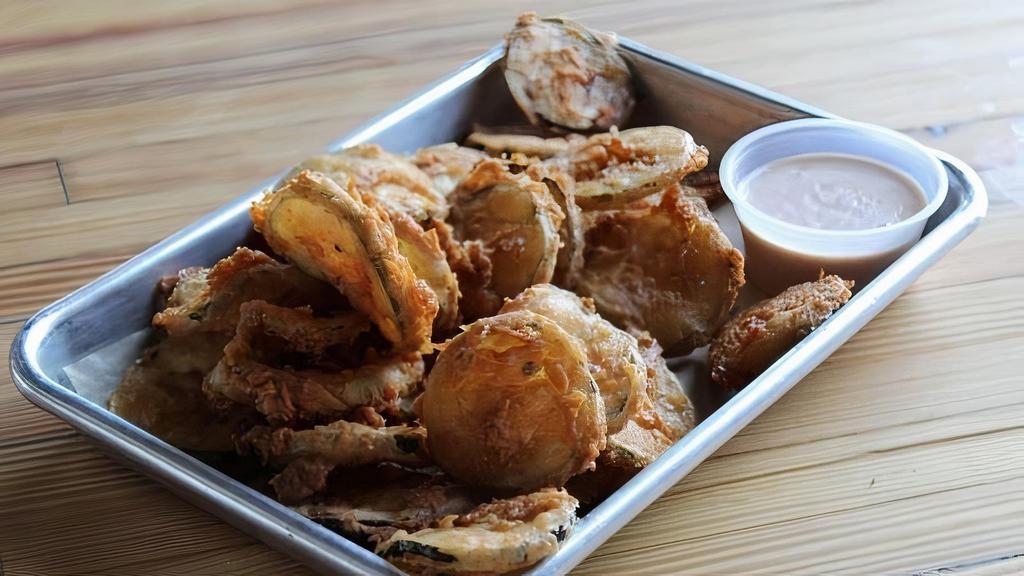 Fried Pickles · Pickled in house. Served with your choice of ranch or remoulade.