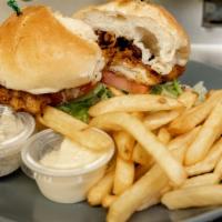 Chicken Cutlet Deluxe Sandwich · On a hard roll with lettuce and tomato, served with French fries, cole slaw and pickle.