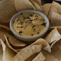 Concho Valley Queso
 · House made queso mixed with Italian sausage, diced tomatoes, and green chiles.