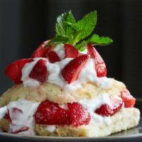 Strawberry Shortie · Our buttermilk biscuit paired with macerated strawberries & whipped cream and finished with ...