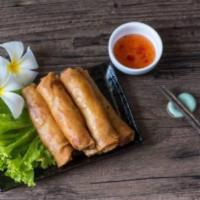 Traditional Eggroll (3 Pcs) · Cabbage, carrots, green onions, & glass noodles in a crispy wonton wrapper. Served with rice...
