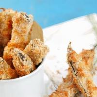 Fried Eggplant Fries · Fried eggplant fries dipped in flour and cornmeal.