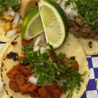 Street Tacos · Corn or flour tortilla with your choice of meat topped off with fresh onion and cilantro