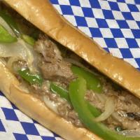 Philly Cheesesteak Sandwich · Marinated  fajita beef, melted fancy provolone, green bell peppers, mushrooms, and onions hu...