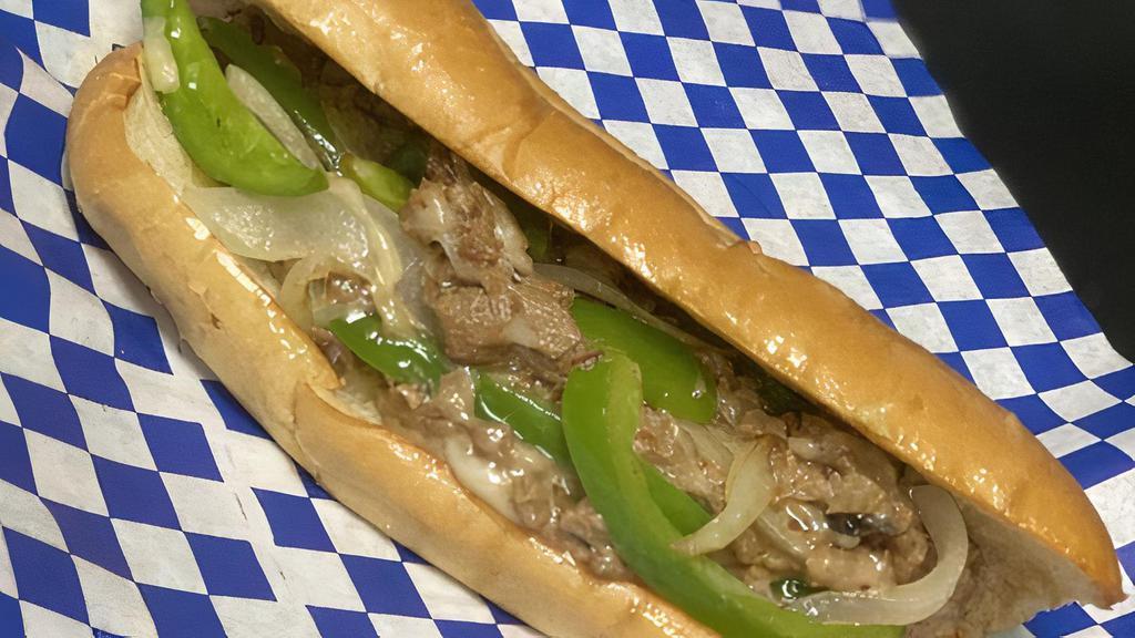 Philly Cheesesteak Sandwich · Marinated  fajita beef, melted fancy provolone, green bell peppers, mushrooms, and onions hugged by a toasted garlic butter hoagie bread served with a side of seasoned fries