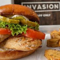 Grilled Chix · A juicy grilled marinated chicken breast with dill mayo, lettuce tomato, onion pickles all o...