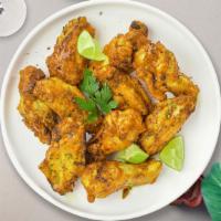 Pepper Zinger Wings · Fresh vegan chicken wings breaded, fried until golden brown, and tossed in lemon pepper sauc...