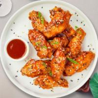 Sweet Zinger Wings · Fresh vegan chicken wings breaded, fried until golden brown, and tossed in sweet and sour sa...