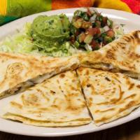 Quesadilla · Flour tortilla, meat of your choice: fajita, chicken, pastor, guacamole, lettuce & pico de g...