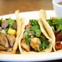 Tacos · Tortillas with meat of your choice beef, chicken, pastor, shrimp or fish