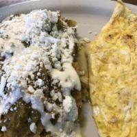 Chilaquiles · Cut tortillas with red or green sauce, crema, queso fresco, epazote, eggs.