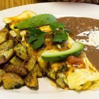 Mexican Omelette · Scrambled egg, ranchera sauce, tomato, bell pepper, avocado, onion, chorizo, queso fresco, r...