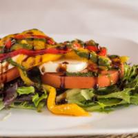 Caprese Rustica · Beefsteak tomato topped with fresh mozzarella, basil, fire-roasted peppers, and extra virgin...