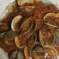 Calamari With Linguini Red · Sautéed with marinara sauce, garlic, olive oil, parsley, oregano, salt, and pepper.