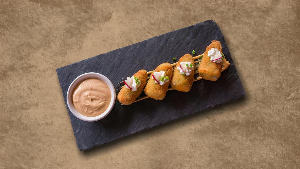 Jalapeno Poppers · These delicious Jalapeno poppers can be enjoyed by our patrons as an appetizer with the delicious wings!