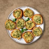 Cheese Garlic Bread · Italian bread topped with cheese to make a delightful offering.
